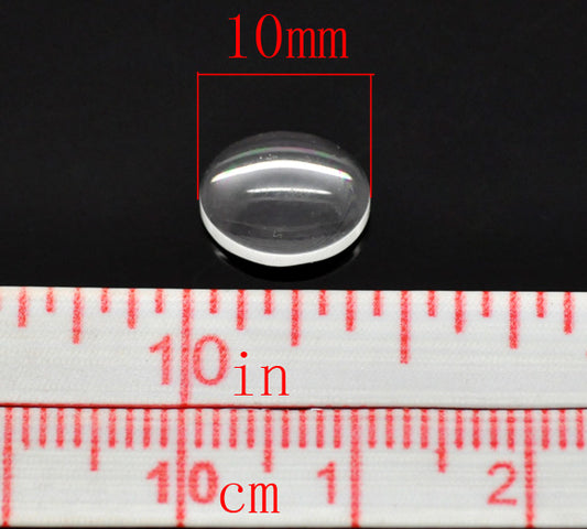 Cabochon, glass, clear, 8 x 10mm oval dome. 100pcs