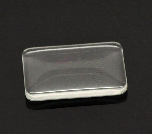 Cabochon, glass, clear, 33x23mm rectangle dome. 10pcs