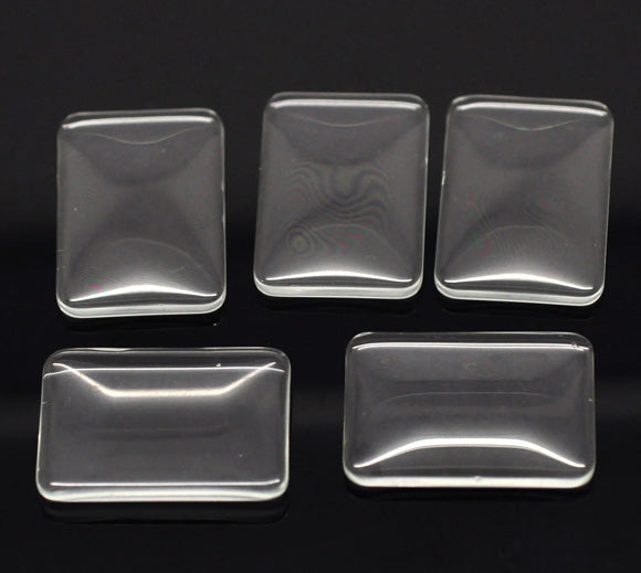 Cabochon, glass, clear, 33x23mm rectangle dome. 10pcs