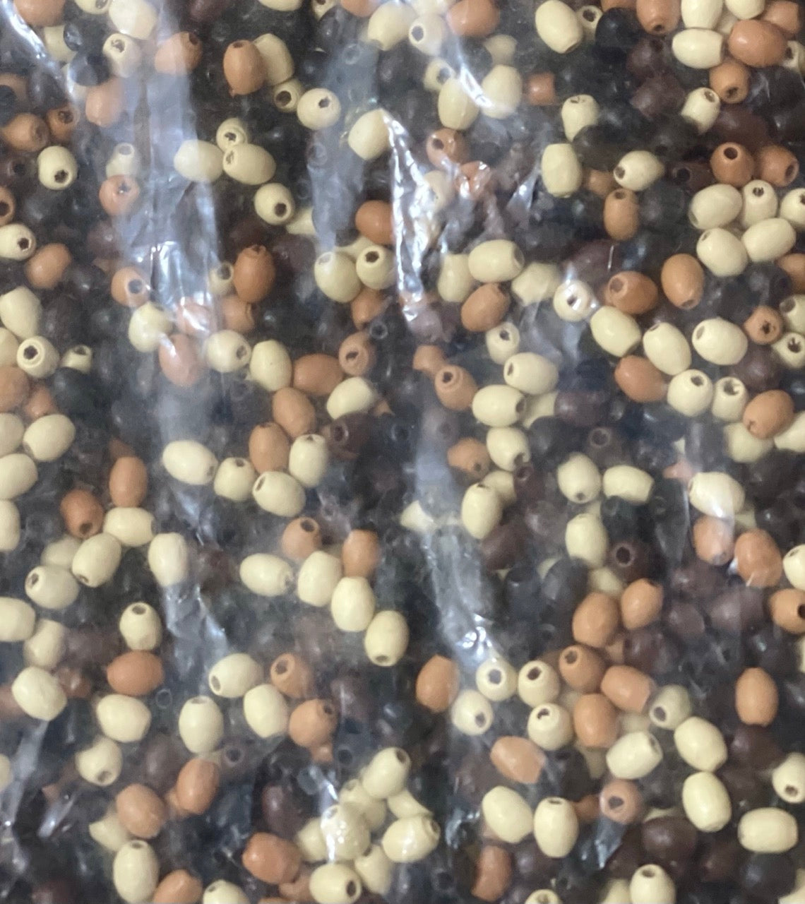 Bead mix, painted wood (dyed), mixed colors, 5 x 3mm oval shape. 100 grams, approx 2,300 beads
